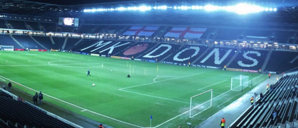 Interior of MK Dons stadium from a corner stand