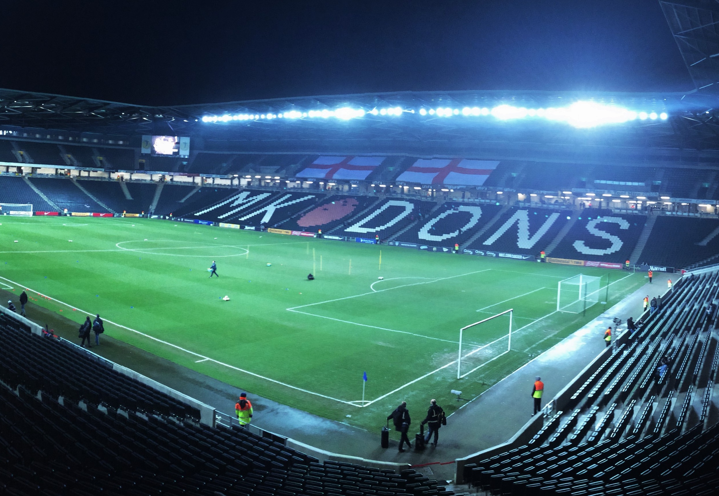 Interior of MK Dons stadium from a corner stand